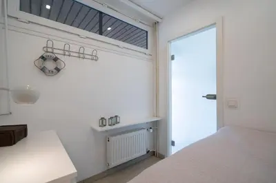Ein Bett oder Betten in einem Zimmer der Unterkunft Ferienpark Sierksdorf App 131