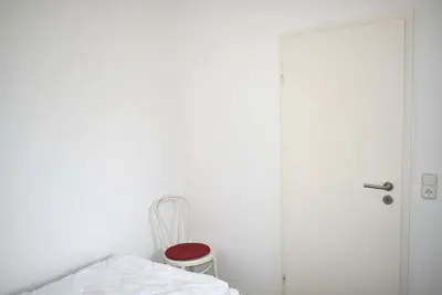 Ein Bett oder Betten in einem Zimmer der Unterkunft An der Seebrücke Ferienwohnung Nr 30