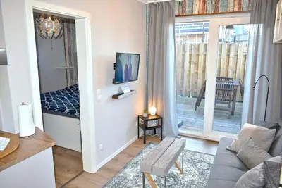 TV/Unterhaltungsangebot in der Unterkunft Lütt Hus an de See Ferienwohnung