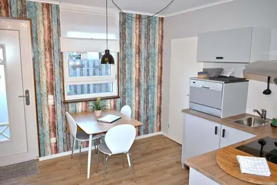 Küche/Küchenzeile in der Unterkunft Lütt Hus an de See Ferienwohnung