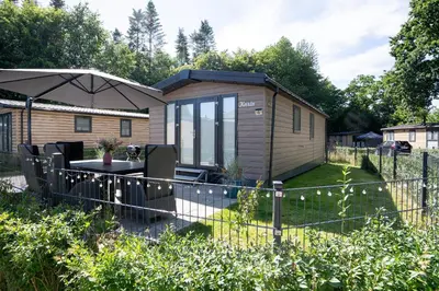 Ein Garten an der Unterkunft Ostseecamp Ferienhaus 