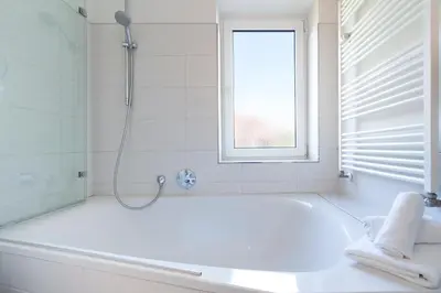 Ein Badezimmer in der Unterkunft Mühlenteich App 14