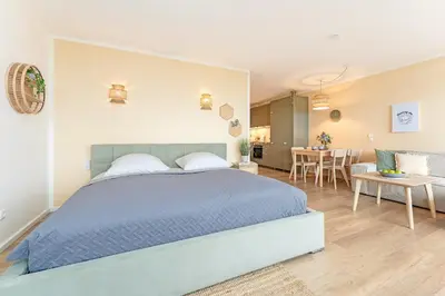 Ein Bett oder Betten in einem Zimmer der Unterkunft Panoramic Morning Sun