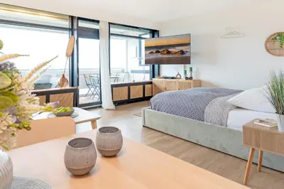 Ein Bett oder Betten in einem Zimmer der Unterkunft Panoramic Morning Sun