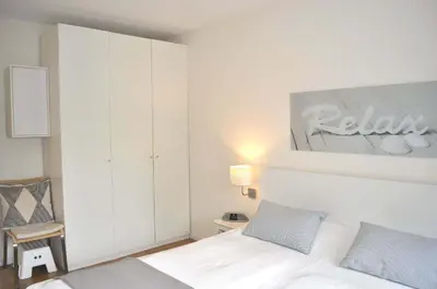Ein Bett oder Betten in einem Zimmer der Unterkunft App 44 Seestern Ferienwohnung