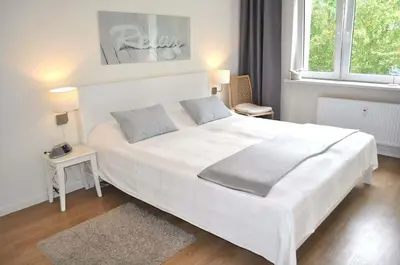 Ein Bett oder Betten in einem Zimmer der Unterkunft App 44 Seestern Ferienwohnung