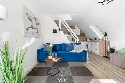 Ein Sitzbereich in der Unterkunft FW Happy Lounge Haffkrug