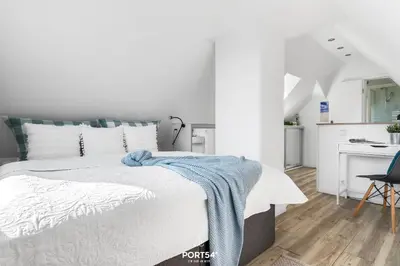 Ein Bett oder Betten in einem Zimmer der Unterkunft FW Happy Lounge Haffkrug