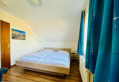 Ein Bett oder Betten in einem Zimmer der Unterkunft Ostwind Seepark 3 1 Scharbeutz