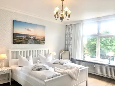 Ein Bett oder Betten in einem Zimmer der Unterkunft Villa Imme