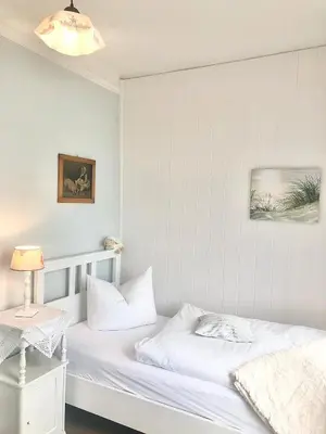 Ein Bett oder Betten in einem Zimmer der Unterkunft Villa Imme