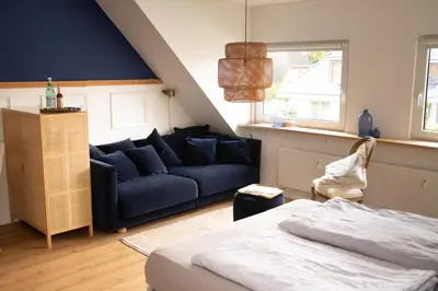 Ein Bett oder Betten in einem Zimmer der Unterkunft Kleine Perle am Timmendorfer Strand