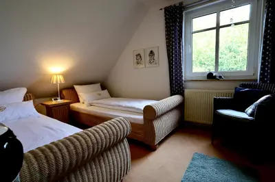 Ein Bett oder Betten in einem Zimmer der Unterkunft Drosselweg 4 Apartment 4