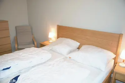Ein Bett oder Betten in einem Zimmer der Unterkunft Carpe Diem Ferienwohnung Nr 143