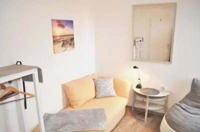 Ein Sitzbereich in der Unterkunft Carpe Diem Ferienwohnung Nr 187 Meerblick
