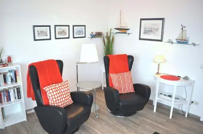 Ein Sitzbereich in der Unterkunft Carpe Diem Ferienwohnung Nr 187 Meerblick