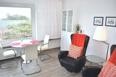 Ein Sitzbereich in der Unterkunft Carpe Diem Ferienwohnung Nr 187 Meerblick