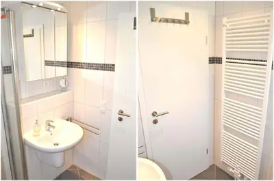 Ein Badezimmer in der Unterkunft Domizil am Meer Nr 15 Ferienwohnung Meerblick