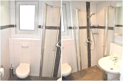 Ein Badezimmer in der Unterkunft Domizil am Meer Nr 15 Ferienwohnung Meerblick