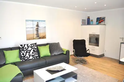Ein Sitzbereich in der Unterkunft Domizil am Meer Nr 15 Ferienwohnung Meerblick