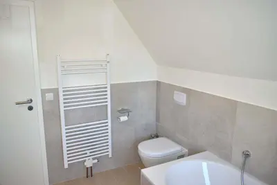 Ein Badezimmer in der Unterkunft Fischerhus Ferienwohnung Deck 2