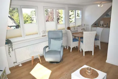 Ein Sitzbereich in der Unterkunft Fischerhus Ferienwohnung Deck 2