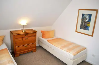 Ein Bett oder Betten in einem Zimmer der Unterkunft Gästehaus Steinhardt Ferienwohnung Nr 03