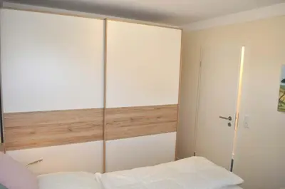 Ein Bett oder Betten in einem Zimmer der Unterkunft Gorch-Fock-Park Ferienwohnung Nr 12