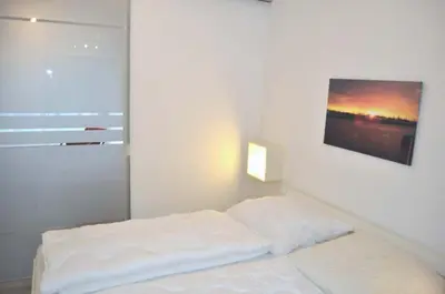 Ein Bett oder Betten in einem Zimmer der Unterkunft Haus Adria Ferienwohnung Nr 06