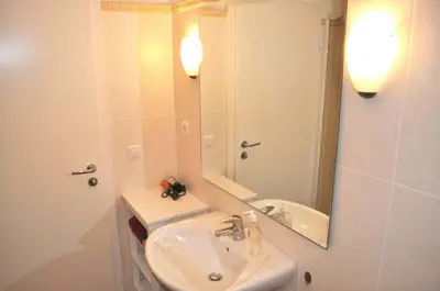 Ein Badezimmer in der Unterkunft Haus am Strand Ferienwohnung Nr 01