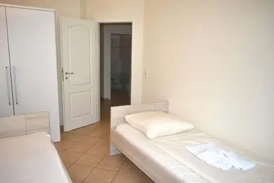 Ein Bett oder Betten in einem Zimmer der Unterkunft Haus am Strand Ferienwohnung Nr 05