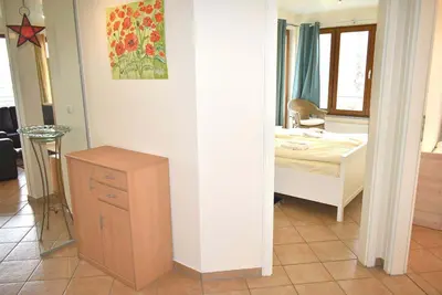 Ein Bett oder Betten in einem Zimmer der Unterkunft Haus am Strand Ferienwohnung Nr 05