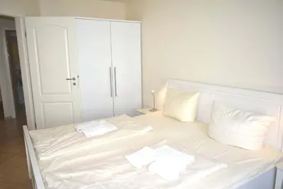 Ein Bett oder Betten in einem Zimmer der Unterkunft Haus am Strand Ferienwohnung Nr 05