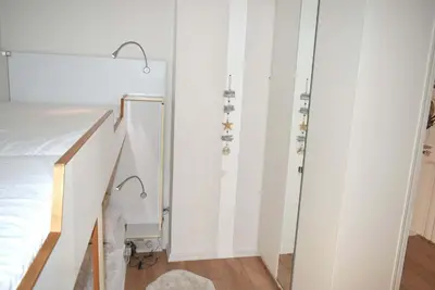 Ein Bett oder Betten in einem Zimmer der Unterkunft Haus Miramar Ferienwohnung Nr 20