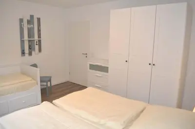 Ein Bett oder Betten in einem Zimmer der Unterkunft Haus Seehase Ferienwohnung Nr 01