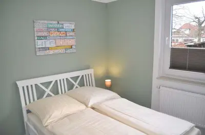 Ein Bett oder Betten in einem Zimmer der Unterkunft Haus Seehase Ferienwohnung Nr 01