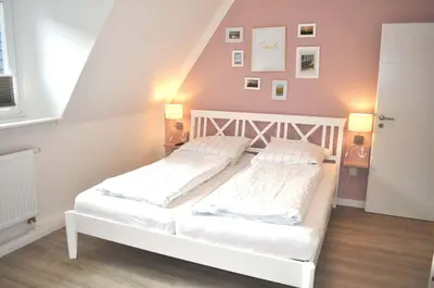 Ein Bett oder Betten in einem Zimmer der Unterkunft Haus Seehase Ferienwohnung Nr 02