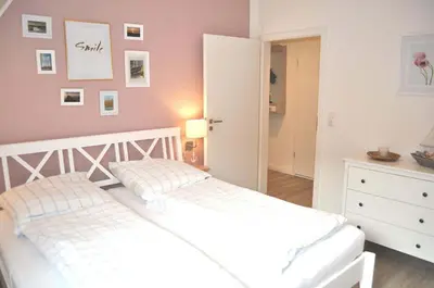 Ein Bett oder Betten in einem Zimmer der Unterkunft Haus Seehase Ferienwohnung Nr 02