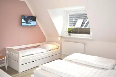 Ein Bett oder Betten in einem Zimmer der Unterkunft Haus Seehase Ferienwohnung Nr 02