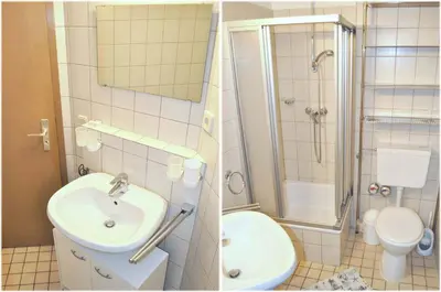 Ein Badezimmer in der Unterkunft Haus Windrose Ferienwohnung Nr 01