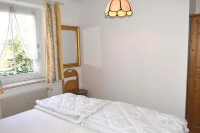 Ein Bett oder Betten in einem Zimmer der Unterkunft Haus Windrose Ferienwohnung Nr 03