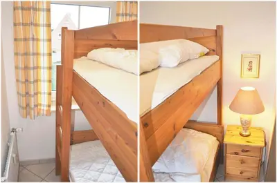 Ein Bett oder Betten in einem Zimmer der Unterkunft Haus Windrose Ferienwohnung Nr 09