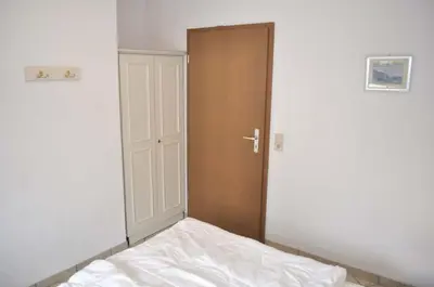 Ein Bett oder Betten in einem Zimmer der Unterkunft Haus Windrose Ferienwohnung Nr 11