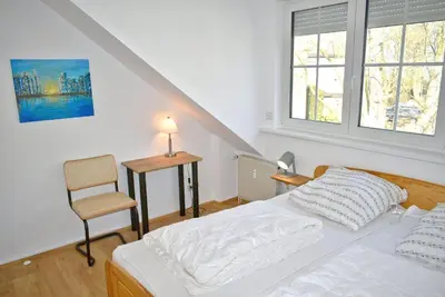 Ein Bett oder Betten in einem Zimmer der Unterkunft Haus Windrose Ferienwohnung Nr 16