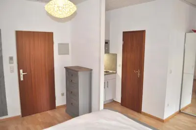 Ein Bett oder Betten in einem Zimmer der Unterkunft Landhaus Köppen Ferienwohnung Nr 03