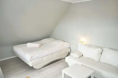 Ein Bett oder Betten in einem Zimmer der Unterkunft Landhaus Köppen Ferienwohnung Nr 16