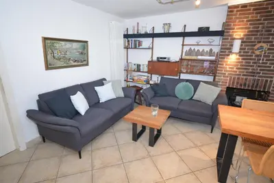 Ein Sitzbereich in der Unterkunft Lille Hus Ferienhaus