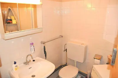 Ein Badezimmer in der Unterkunft Lille Hus Ferienhaus