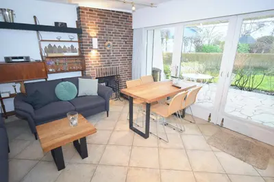 Ein Sitzbereich in der Unterkunft Lille Hus Ferienhaus