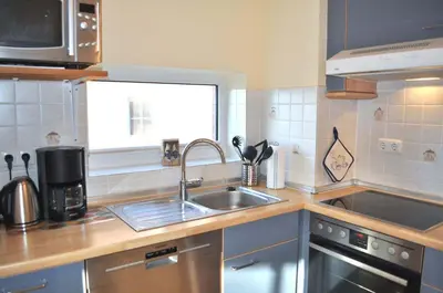 Küche/Küchenzeile in der Unterkunft Ostseeallee 1 Ferienwohnung Jolle